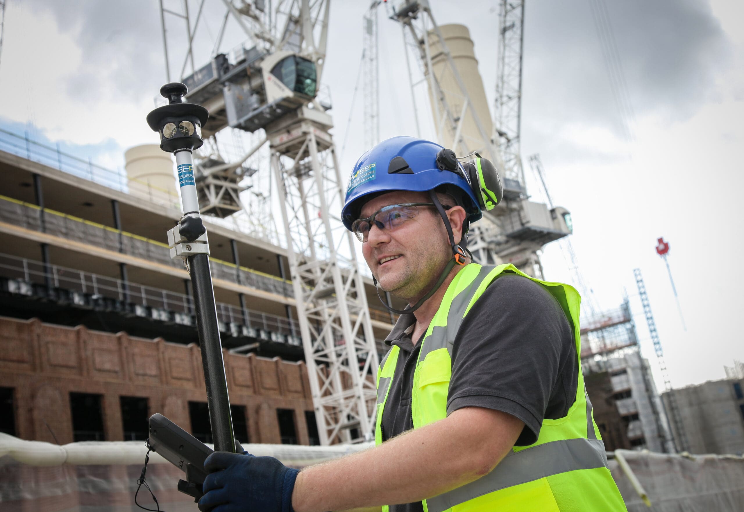 Setting out engineer in Brent marking site layout